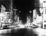 Night street scene, downtown Dallas, Texas by Squire Haskins Photography Inc.