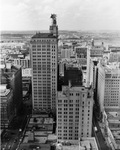 Magnolia building with Pegasus sign on the top, downtown Dallas, Texas. by Squire Haskins Photography Inc.