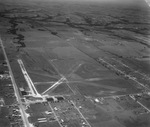 An aerial Highway 77 and airport by Squire Haskins Photography Inc.