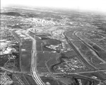 An aerial of freeway and Trinity River by Squire Haskins Photography Inc.