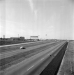 The Dallas area highway with Bigtown sign on left by Squire Haskins Photography Inc.