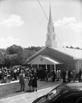 People gathering in front of First Covenant Church by Squire Haskins Photography Inc.