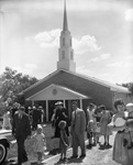 People gathering in front of First Covenant Church by Squire Haskins Photography Inc.