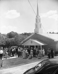 People gathering in front of First Covenant Church by Squire Haskins Photography Inc.