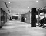 Office building, hallway with shops by Squire Haskins Photography Inc.