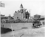 Wagon train carrying 46 bales of cotton pulled by eight horses