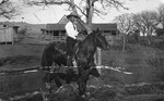 Henry Cook on horse, in charge of Matador Land Company
