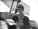 Amelia Earhart and her plane