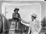 Tex Rickard greeting J. R. Whitley in Henrietta, Texas