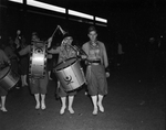 Shriners and El Maida drum corps at Texas and Pacific railway station