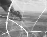 Slush pit oil field fire northeast of Andrews County