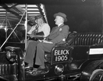 H. C. Gillespie and Amon G. Carter sitting in a 1905 Buick