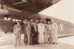 Passengers waiting to board an American Airways plane