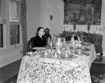 Mrs. Spencer Smith at table, 1938