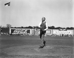 Amon G. Carter throwing first pitch of the season