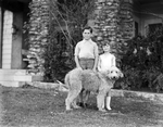 Amon G. Carter's children with the family dog on Thanksgiving Day