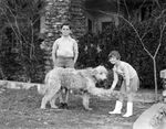 Amon G. Carter's children with the family dog on Thanksgiving Day