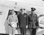 Major H. T. Oldfield, Patrick J. Hurley, and Lt. C. W. Cousland at the airport