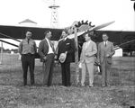 Lt. C. W. Cousland, Amon G. Carter, Patrick J. Hurley, James M. North, and Major H. T. Oldfield at the airport