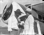 Will Rogers with Amon G. Carter at the airport