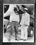 Amon G. Carter and Will Rogers at airport