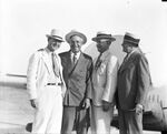 Will Rogers with Amon G. Carter and others