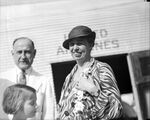Eleanor Roosevelt standing next to a United Air Lines plane at Meacham Field