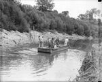 The Texas Steer departing for Chicago via the Trinity River, crew members Commodore Col. B. M. (Basil Muse) Hatfield, Buddy Cashion, J. F. Norris, D. E. Bennett, and W. J. West