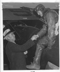 Lieutenant W. E. Davis shakes hands with H. E. Crisman