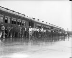 200 Civilian Conservation Corps men detraining before boarding trucks for Lake Worth