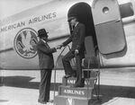 Mayor Van Zandt Jarvis congratulating Jim Ingram, pilot of the American Airlines Douglas A-74 monoplane