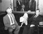 Duke Taylor of Vance, Texas, left, and Lionel Bevan with Angora goat, mascot of Central Centennial, Dallas