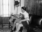 Mr. and Mrs. John Kennedy, owners of horse breeding farm on Blue Mound Road