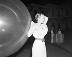 Sally Rand rehearses with big balloon for Casa Manana show
