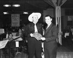 Texas Governor James V. Allred presents Paul Whiteman with Radio Stars' Distinguished Service Award