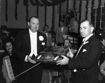 Robert Hanger presenting pistols to Paul Whiteman at Assembly Ball