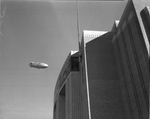 Goodyear blimp in sky over Fort Worth Frontier Centennial
