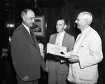 Amon G. Carter, Hays Bacus, and president E. M. Waits of Texas Christian University (T. C. U.)