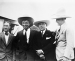 Amon G. Carter with Will Rogers and two unidentified mens or early 1930s
