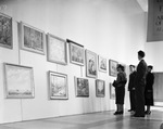 Visitors at exhibit of Texas art during the Spring Automobile Show