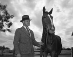 Colonel T.J. Johnson and thoroughbred Pad