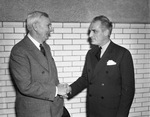 Francis Mcmillen (right), renowned American violinist, greeted by President E.M. Waits of Texas Christian University (TCU)