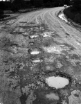 Pot holes in Meandering Road at Lake Worth