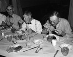 All-male church dinner at Travis Avenue Baptist Church; enjoying the meal, from left, E.M. Harris and W.F. Hood