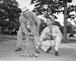 General Ministers' Association of Fort Worth annual picnic at Baird Farm, Arlington; from left, Rev. Fletcher Isbell and Rev. Wilbur McDaniel with croquet mallets