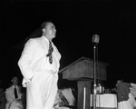 Texas Governor-elect W. Lee O'Daniel at the microphone during National Salesmen's Crusade rally at TCU Stadium