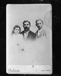 Copy negative of old photograph (cabinet card?) of young girl, adult man, and young boy