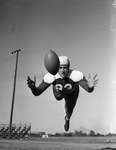 North Texas Agricultural College (N. T. A. C.) football letterman Roy Sikes