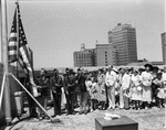 Flag raising ceremony on roof of new Fort Worth Public Library