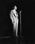 Arkansas philosopher Bob Burns performs before a microphone at Casa Manana, 08/21/1939